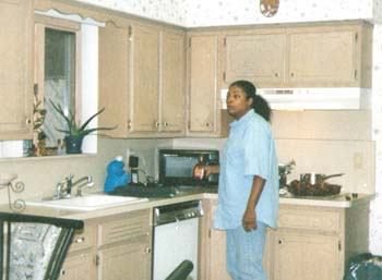 Troy Alexander Flynn (wife Cheryl in Kitchen)